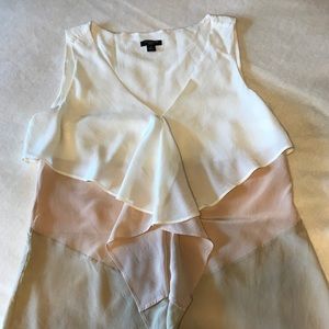 Flowy pullover top in blush-nude tones. Silk